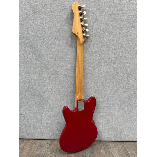 5115 - A 1960's Guyatone electric guitar, thought to be an LG-55, red body, aluminium guard, with hard case... 