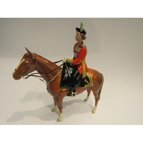 8126 - A Beswick figure of H.M. Queen Elizabeth II on Imperial horse, in chestnut gloss, model no. 1546, (l... 