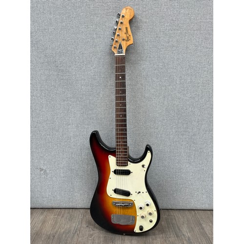 5128 - A 1970's Guyatone Stratocaster style electric guitar, sunburst body with off-white guard, with beatb... 