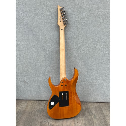5138 - An Ibanez RG320FM electric guitar with figured amber body, serial no. CP04106785, with soft case