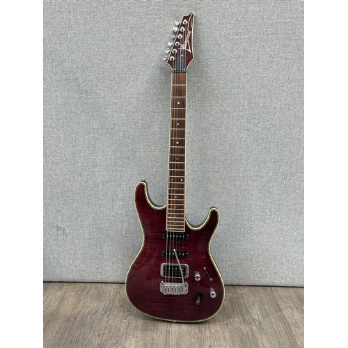 5136 - An Ibanez SA series electric guitar, purple figured body, abalone binding