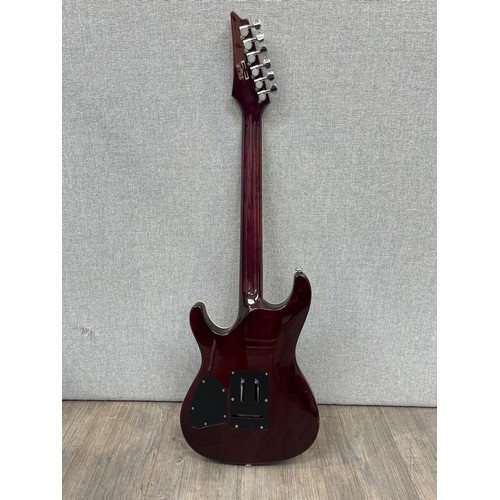 5136 - An Ibanez SA series electric guitar, purple figured body, abalone binding