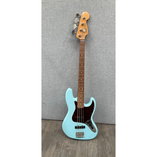 5217 - A Fender Vintera '60s Jazz Bass guitar in Daphne Blue, serial number MX19059412, with tweed style ha... 