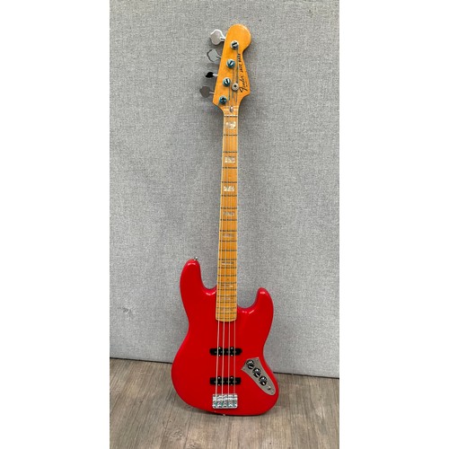 5129 - A 1978 or later Fender Jazz Bass (USA), refinished body, Fiesta red equivalent colour, serial no. S8... 