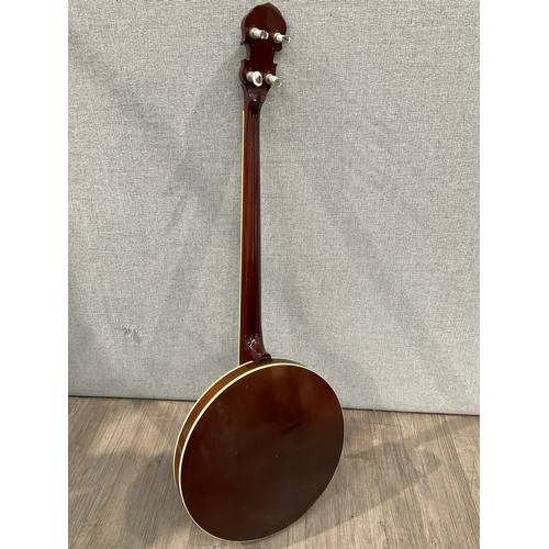 5172 - An Ozark five string banjo, closed back, circa 1990 approx., with hard case