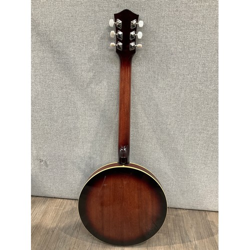 5167 - An Ozark six string guitar banjo with sunburst back, fitted hard case