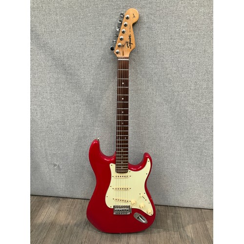 5180 - A Fender Squier Strat electric guitar, serial number YN647855