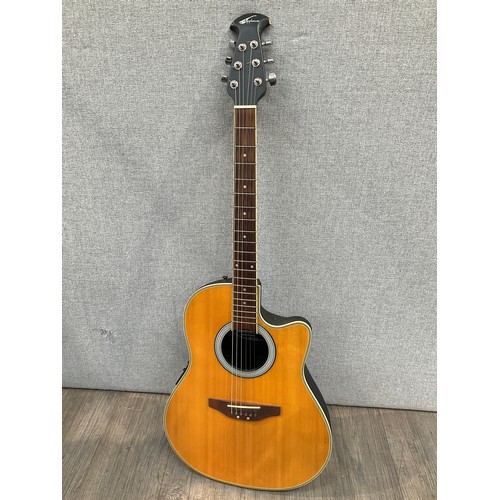 5174 - An Ovation Applause Model AE28 electro acoustic guitar, chip to headstock  (R)  £40