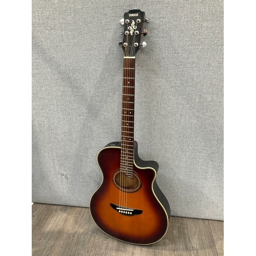 5110 - A Yamaha APX-6C electro acoustic guitar, sunburst top, serial no. 40614860, soft case