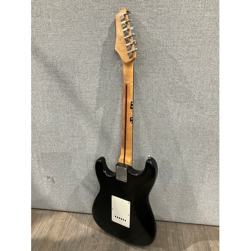 5103 - An AXL Player Deluxe Stratocaster style electric guitar, black body, cream guard, fitted case