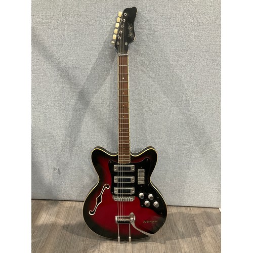 5132 - A 1960's Czechoslovakian Jolana Tornado electric guitar, red burst body with hollowbody, with Jolana... 