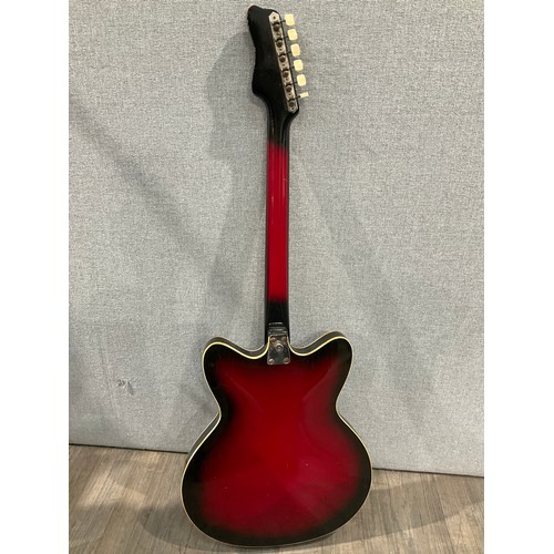 5132 - A 1960's Czechoslovakian Jolana Tornado electric guitar, red burst body with hollowbody, with Jolana... 