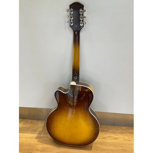 5228 - A 1950’s / 60’s Harmony arch top electro acoustic guitar, tobacco sunburst, guard with volume and to... 