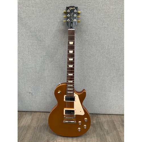 5209 - A Gibson Les Paul 'Tribute' 2018 Gold Top, serial no. 180045762, blemish beside top pickup, with Gib... 