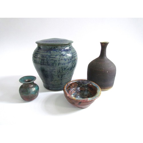 7135 - A collection of studio pottery including lidded canister with mottled blue glaze, impressed seal and... 