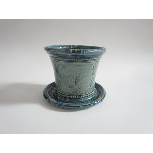 7104 - An A & J Young Gresham Pottery planter and dish in blue glaze with foliate detail, total height 14cm