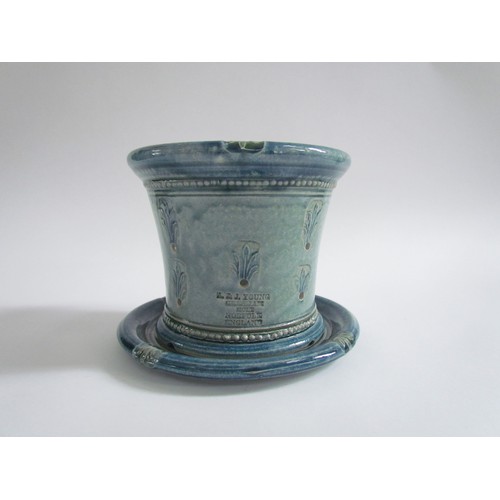 7104 - An A & J Young Gresham Pottery planter and dish in blue glaze with foliate detail, total height 14cm