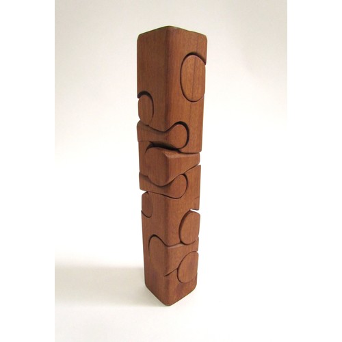 7548 - BRIAN WILLSHER (1930-2010) A teak puzzle tower. Unsigned, 26.5cm high x 4.7cm x 4.5cm    (C)