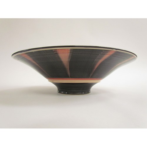 7102 - CHRISTINA FEITER (late 20th Century): A studio pottery flared bowl with painted detail in pink and c... 