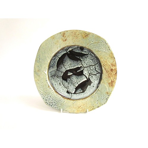 7101 - MARGARET FRITH (b.1943): A Brookhouse Pottery dish with wax resist detail. Impressed seals (partiall... 