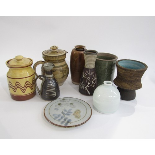 7143 - A collection of studio pottery including Highland stoneware trivet, Harry Juniper lidded pot, Antje ... 