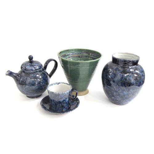 7139 - Three Jo Rollason items of studio pottery including blue mottled glazed teapot, cup and saucer and v... 