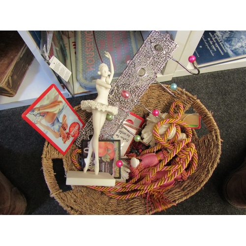 1263 - A mixed lot with a retro style tin sign, curtain tie backs, tassels, coat hangers etc together with ... 