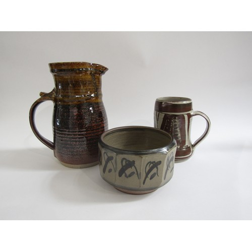 7141 - A studio pottery tankard by Harry & May Davis Crowan Pottery 14.5cm high, a Thomas Ploughman jug, 23... 