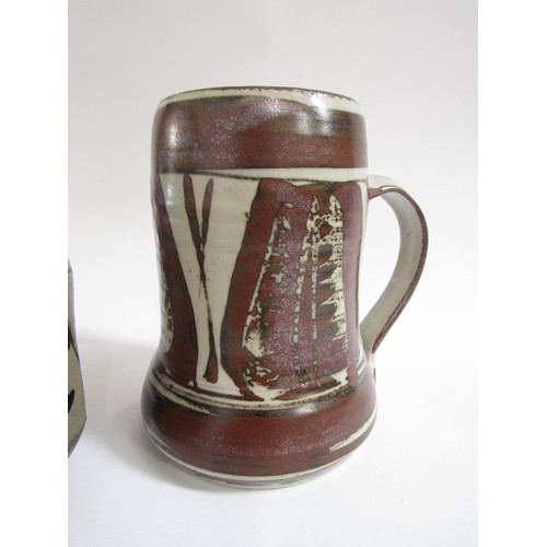 7141 - A studio pottery tankard by Harry & May Davis Crowan Pottery 14.5cm high, a Thomas Ploughman jug, 23... 