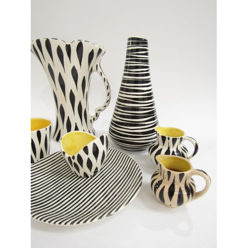 7006 - A collection of 1950's ceramics with Zebra stripe detail including Sandland, Empire, Lord Nelson war... 