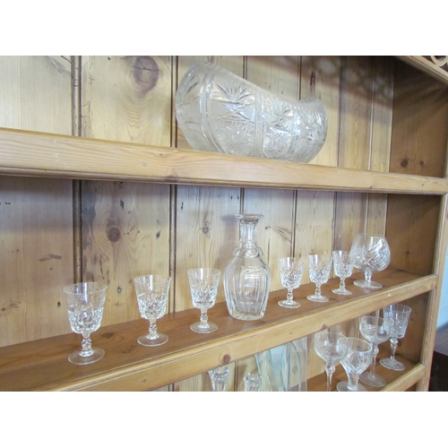 1073 - A quantity of glassware including crystal sherry glasses etc