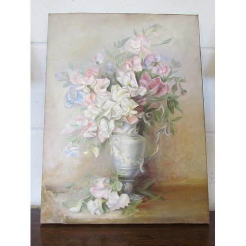 1078 - A still-life oil on canvas of sweet peas in a vase, 51cm x 38cm