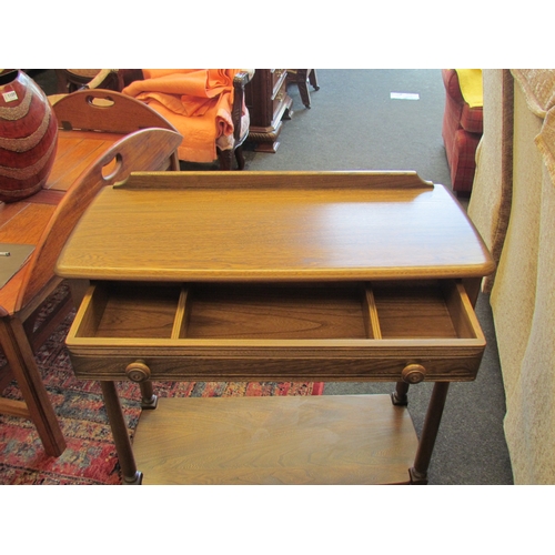 1108 - An Ercol hall table No. 1192, golden dawn finish, with single drawer and under-shelf