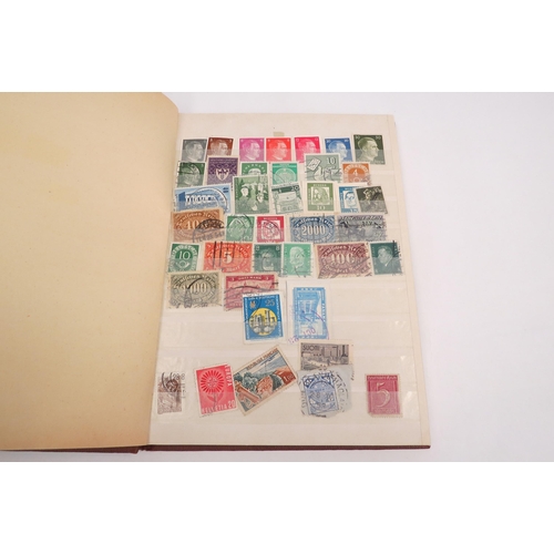 1271 - A stamp album containing various aged world wide stamps including Deutsches Rerch, Poste Halsane etc... 