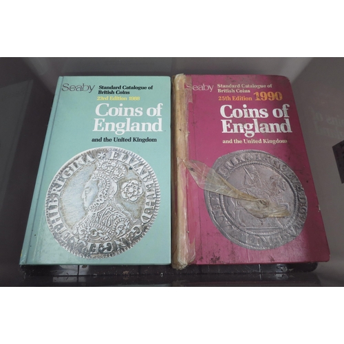 1272 - A quantity of metal detecting finds, rings, coins in two boxes and reference books