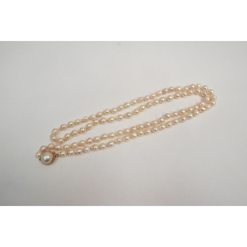 1277 - A single strand cultured pearl necklace with 14k gold clasp   (C)