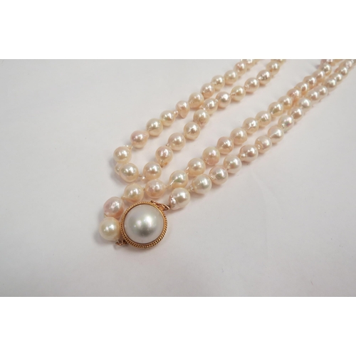 1277 - A single strand cultured pearl necklace with 14k gold clasp   (C)