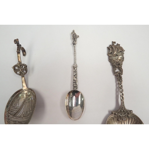 1283 - Three white metal embossed spoons  (C)