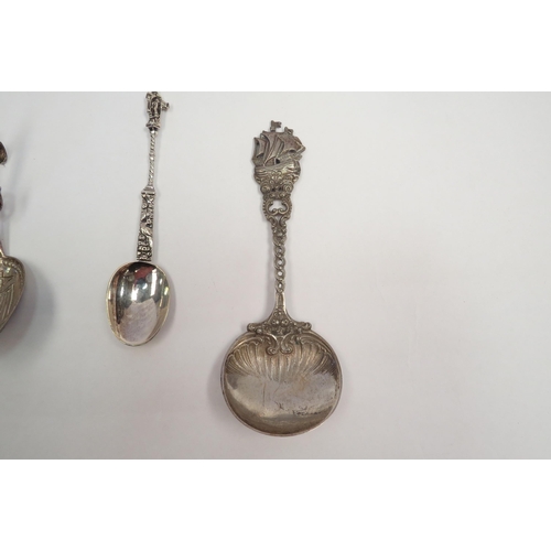 1283 - Three white metal embossed spoons  (C)