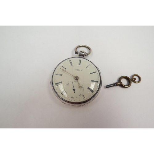 1296 - A silver fob watch with key