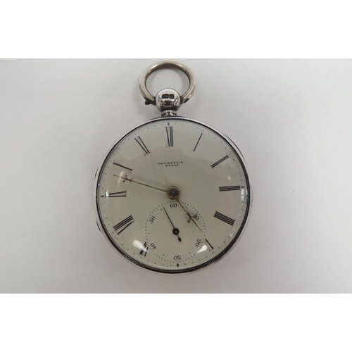 1296 - A silver fob watch with key