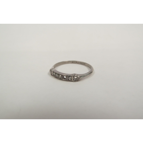 1300 - A Platinum ring set with small diamonds, one loose   (C)