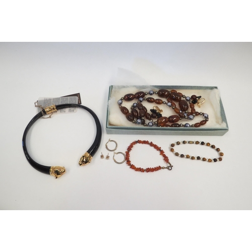 1304 - An amber bead bracelet, tiger's eye and pearl bracelet, Panther collar necklet etc