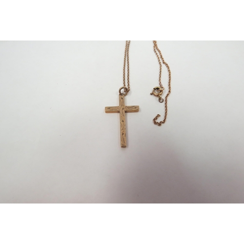 1318 - A 9ct gold crucifix pendant hung on chain, 3.4g