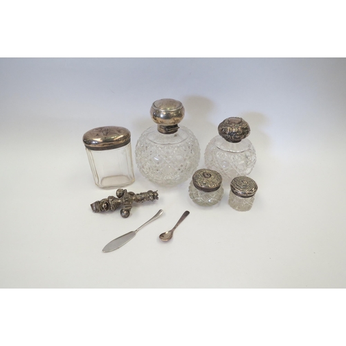 1333 - A selection of mainly silver topped cut glass pots and knife, together with a white metal children's... 