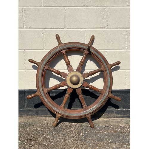 8093 - A late 19th / early 20th Century teak and brass mounted ship’s wheel, 106cm approximate diameter