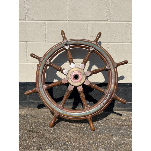 8093 - A late 19th / early 20th Century teak and brass mounted ship’s wheel, 106cm approximate diameter