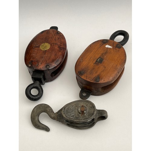 8069 - A quantity of nautical pulleys and shackles etc