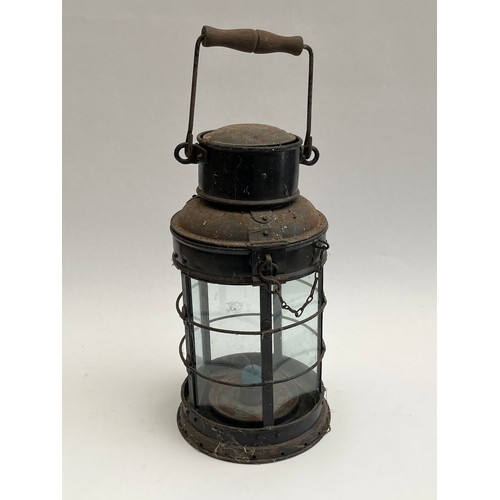 8101 - An early 20th Century black painted metal candle lantern