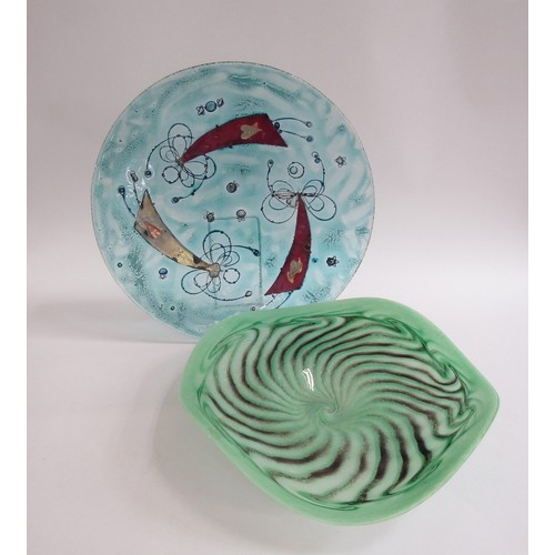 7148 - A large art glass dish with green swirl design, signed Ourglass 2007 to base, 34cm diameter and a la... 